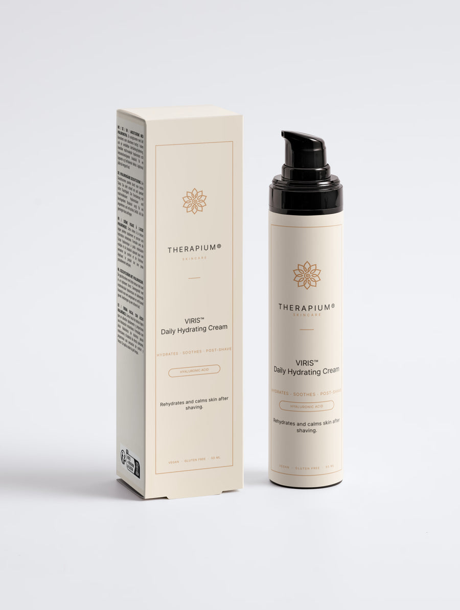 Therapium VIRIS™ Daily Hydrating Cream, airless pump bottle with a black cap next to its carton, front view on a plain studio background
