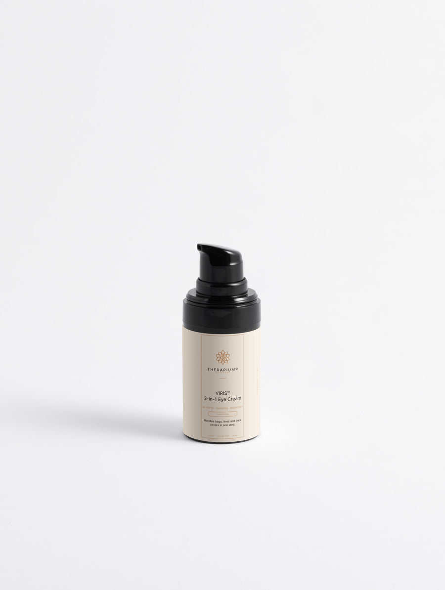 Therapium VIRIS™ 3-in-1 Eye Cream, airless pump bottle with a black cap, front view on a plain studio background