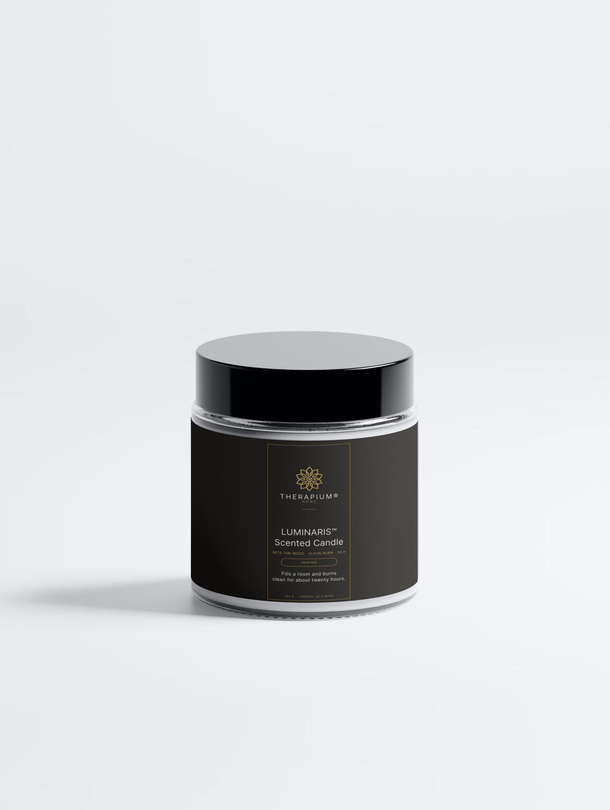 Therapium LUMINARIS™ Heather soy wax candle in a clear glass vessel, upright against a plain studio background
