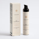 Therapium VIRIS™ Daily Hydrating Cream, airless pump bottle with a black cap next to its carton, front view on a plain studio background