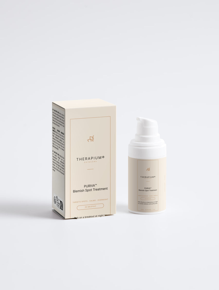Therapium PURIVA™ blemish spot serum, 15 ml airless pump bottle next to its carton, front view on a plain studio background