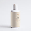 Therapium ROOTSYNC™ Nourish & Volume Shampoo, 290 ml white bottle with cream and copper label, front view