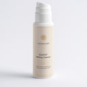 Therapium OLEATIS™ Melting Cleanser, 150 ml cream pump bottle, front view on a plain studio background