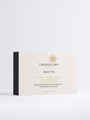 Therapium Serum Trio gift box, front of the printed sleeve on a plain studio background