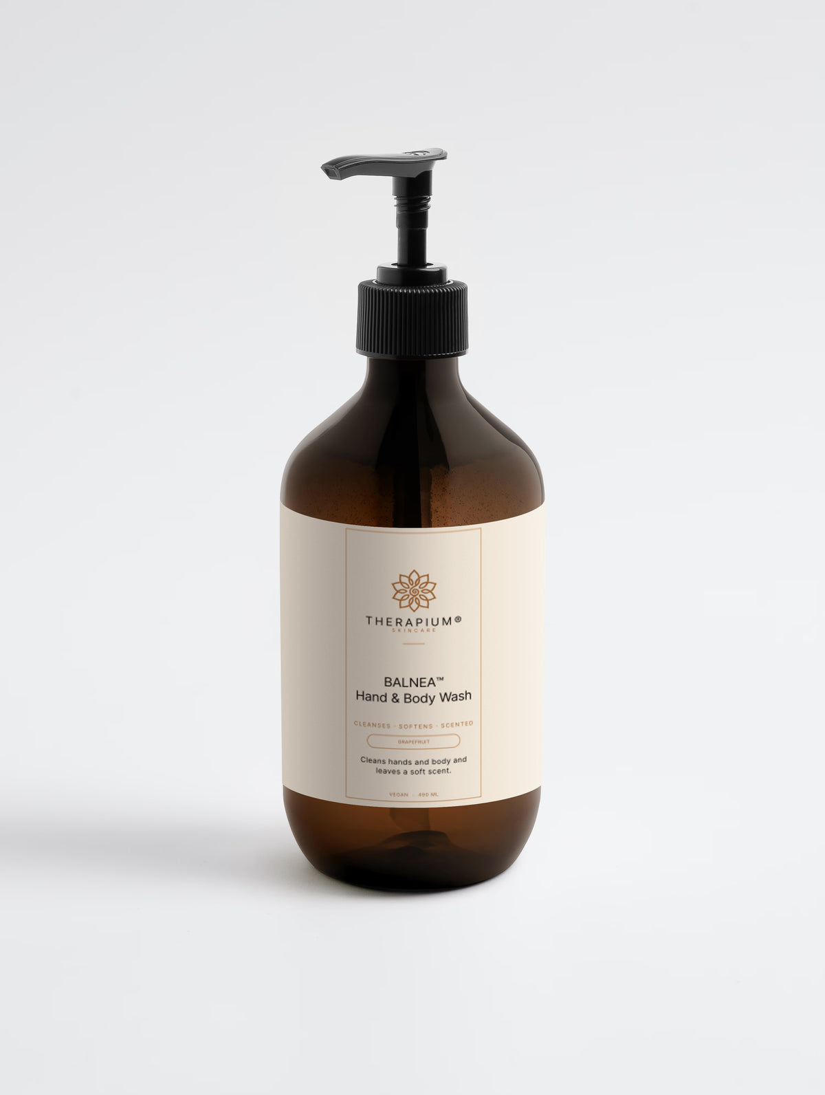 Therapium BALNEA™ Hand & Body Wash — Grapefruit, 490 ml amber pump bottle, front label, on a plain studio background