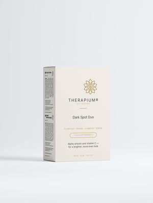 Therapium Dark Spot Duo gift box, front of the printed sleeve on a plain studio background