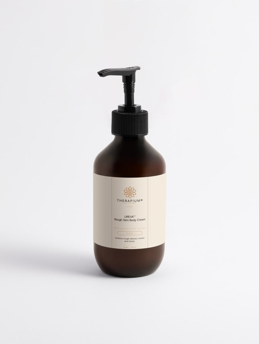 Therapium UREVA Rough Skin Body Cream with 5% urea, 280 ml amber pump bottle with cream label, front view on a plain studio background