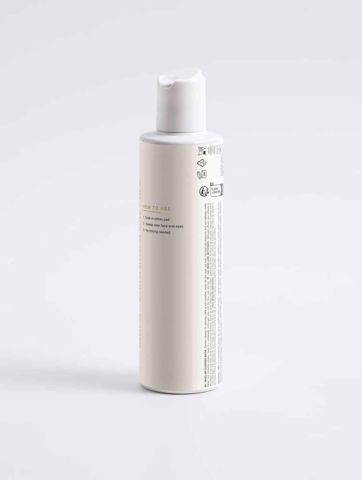 Back of the Therapium Micellar Cleansing Water bottle showing the three How to use steps and the multilingual ingredients list