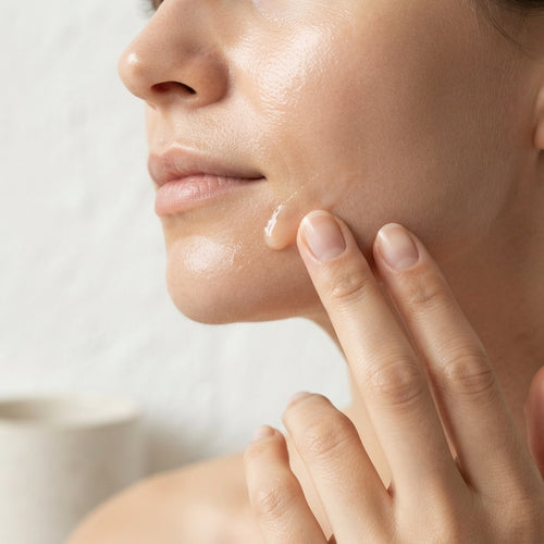 Pressing Therapium RENOVÉA™ Firming Serum along the jawline