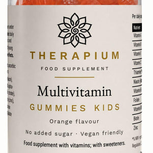 Close-up of the front label: Multivitamin Gummies Kids, orange flavour, no added sugar, vegan friendly
